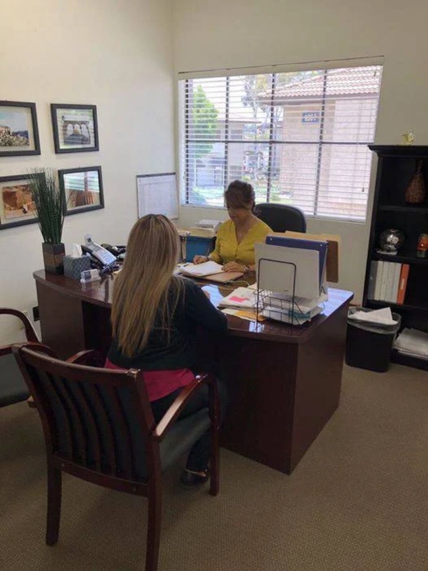 A consultation at the desk at Affordable Document Services